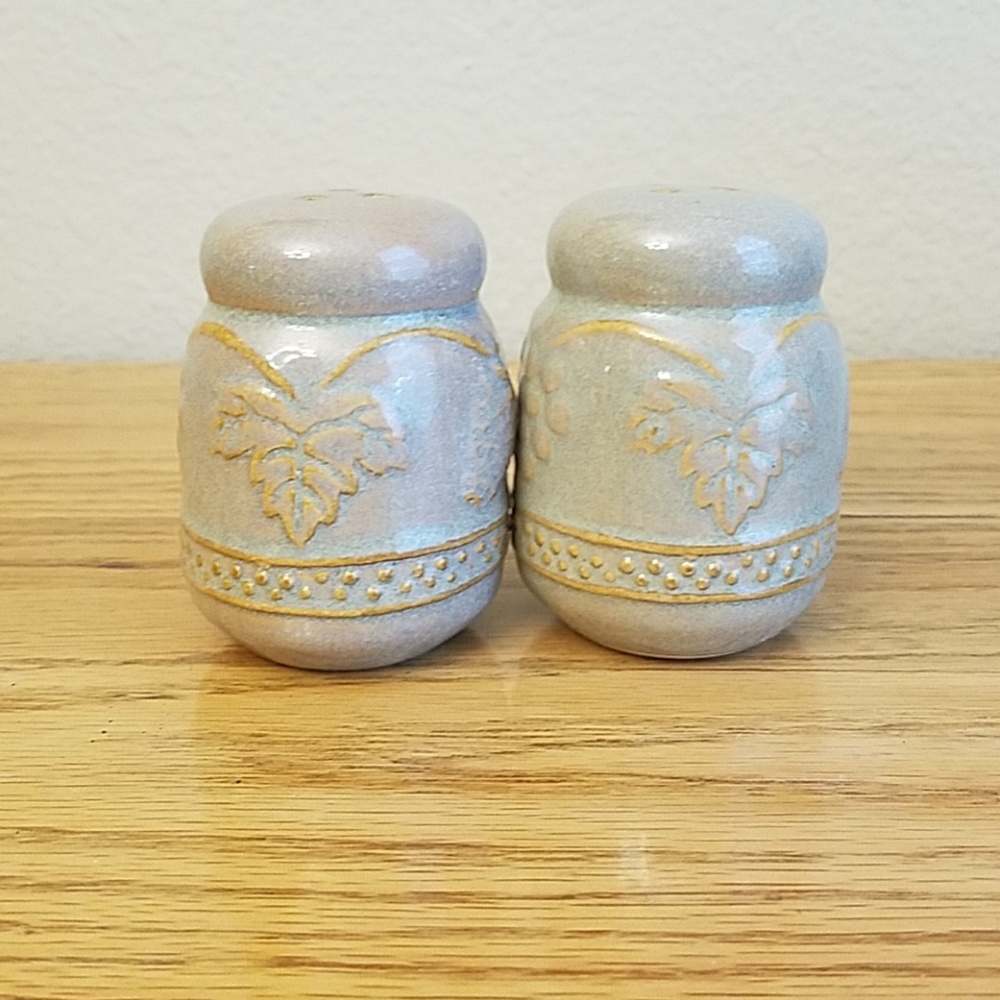 Salt and pepper shakers, cream and sugar pitchers